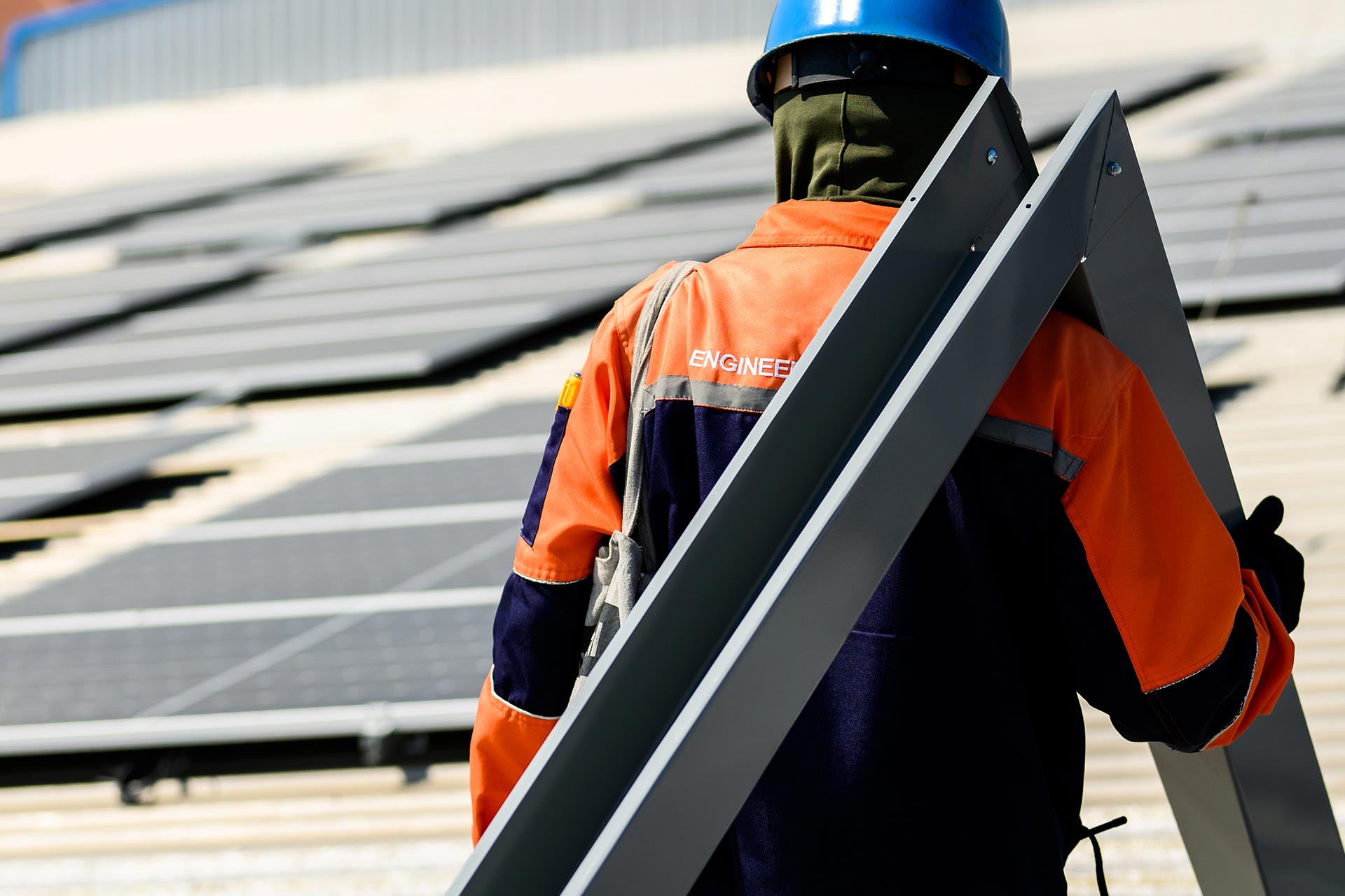 Maintenance worker with safety helmet working